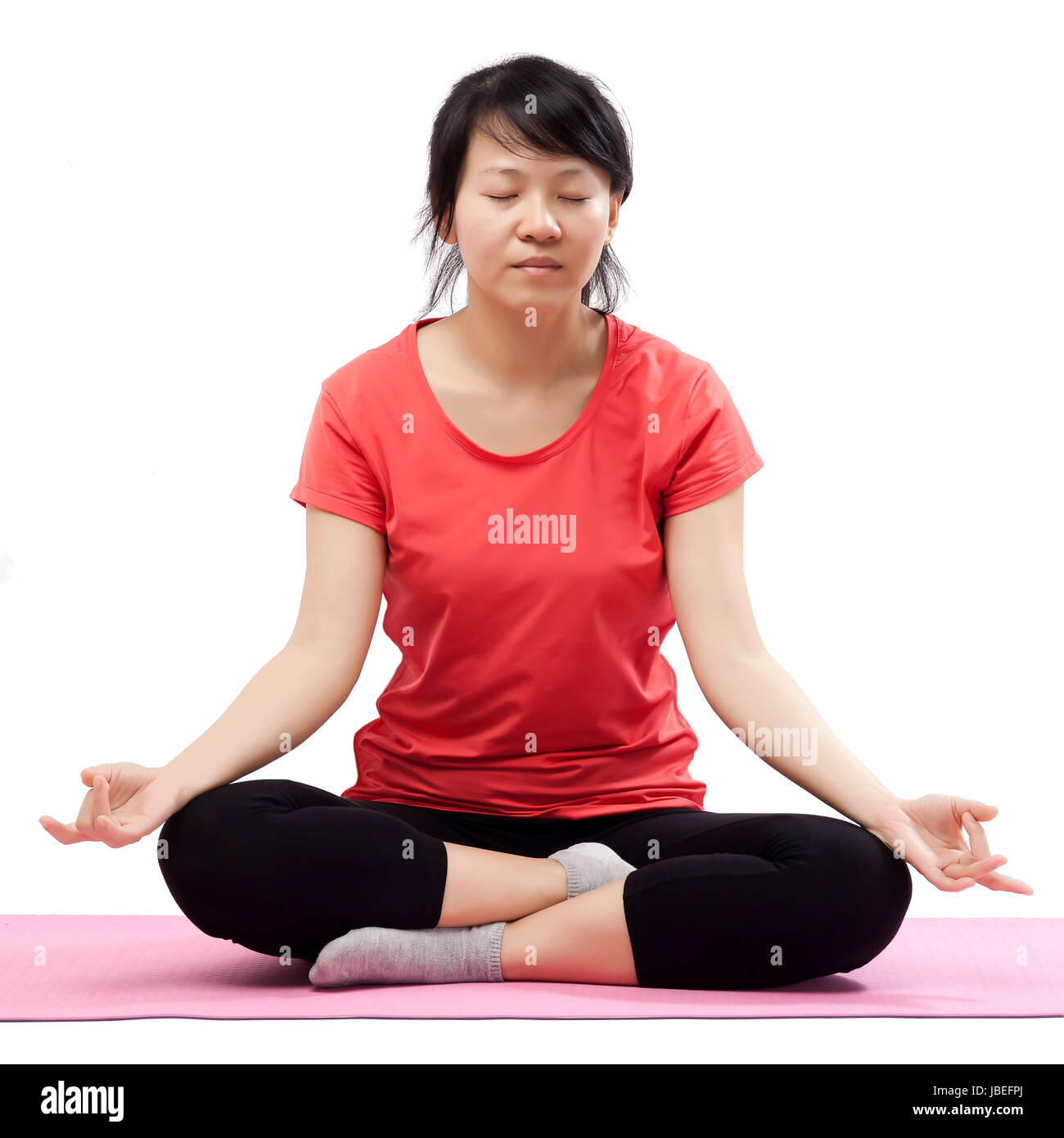 Woman practicing yoga isolated on white background Stock Photo - Alamy