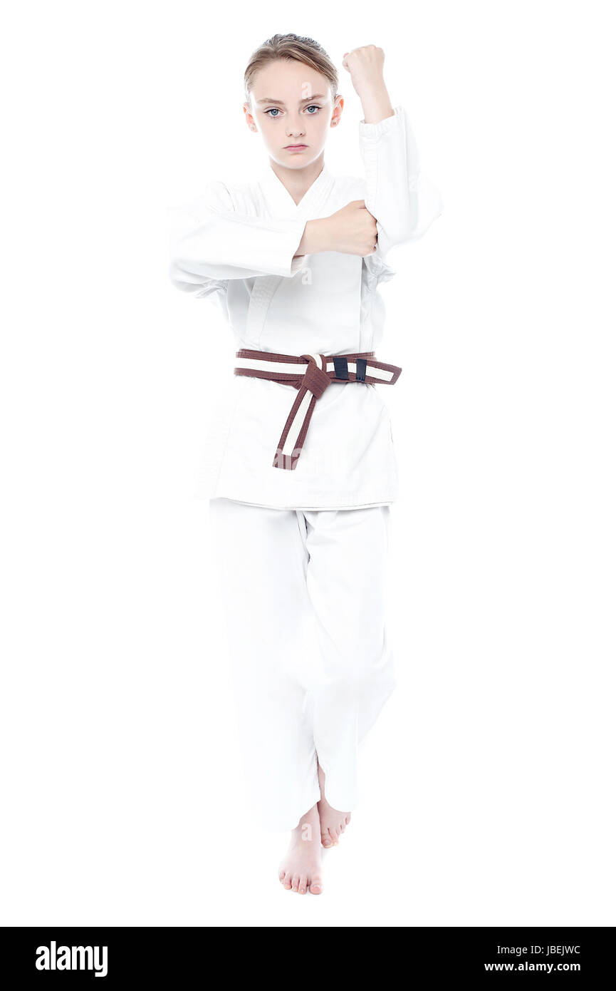 Young karate girl ready to attack Stock Photo - Alamy