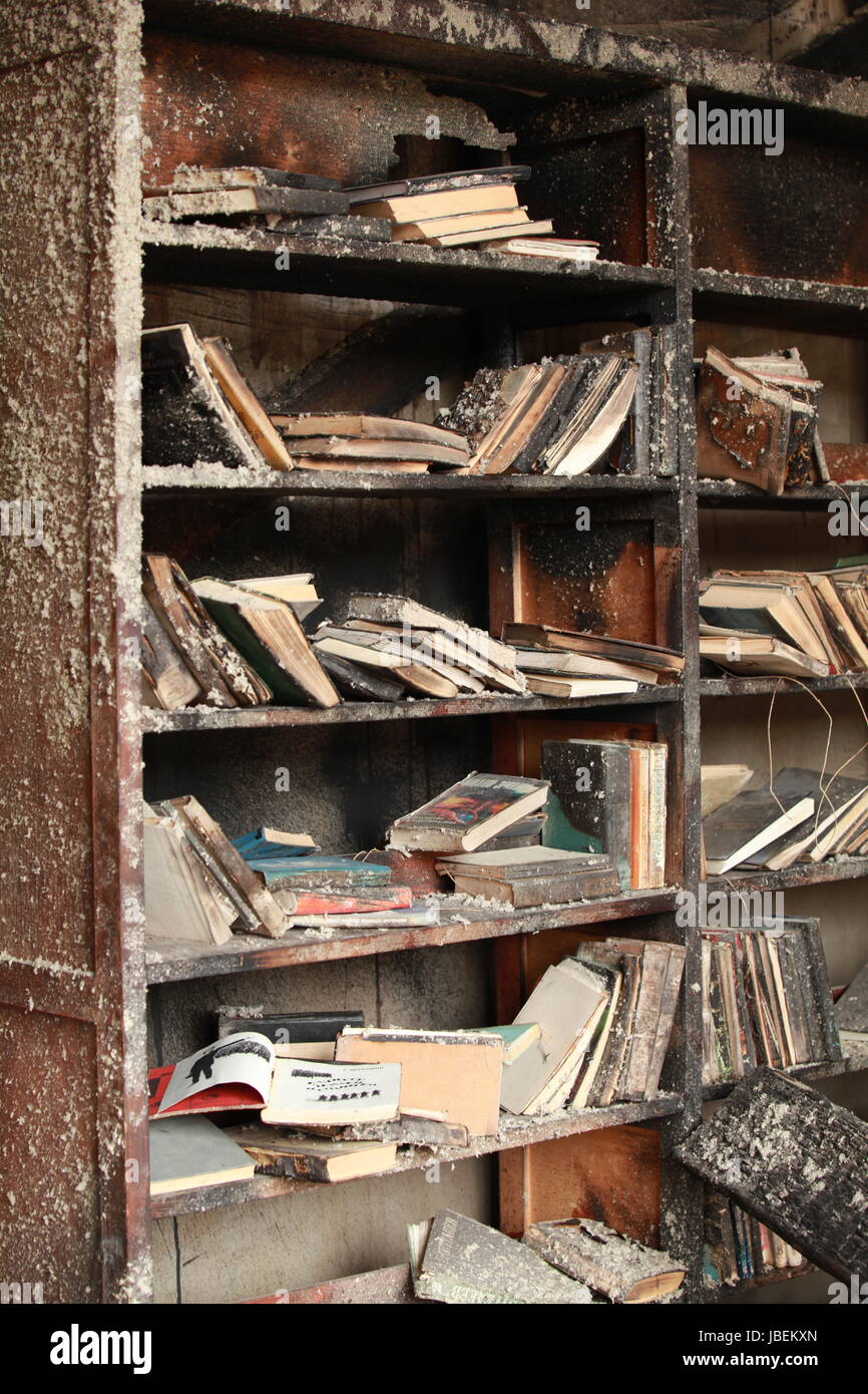 burned books on library shelves Stock Photo Alamy