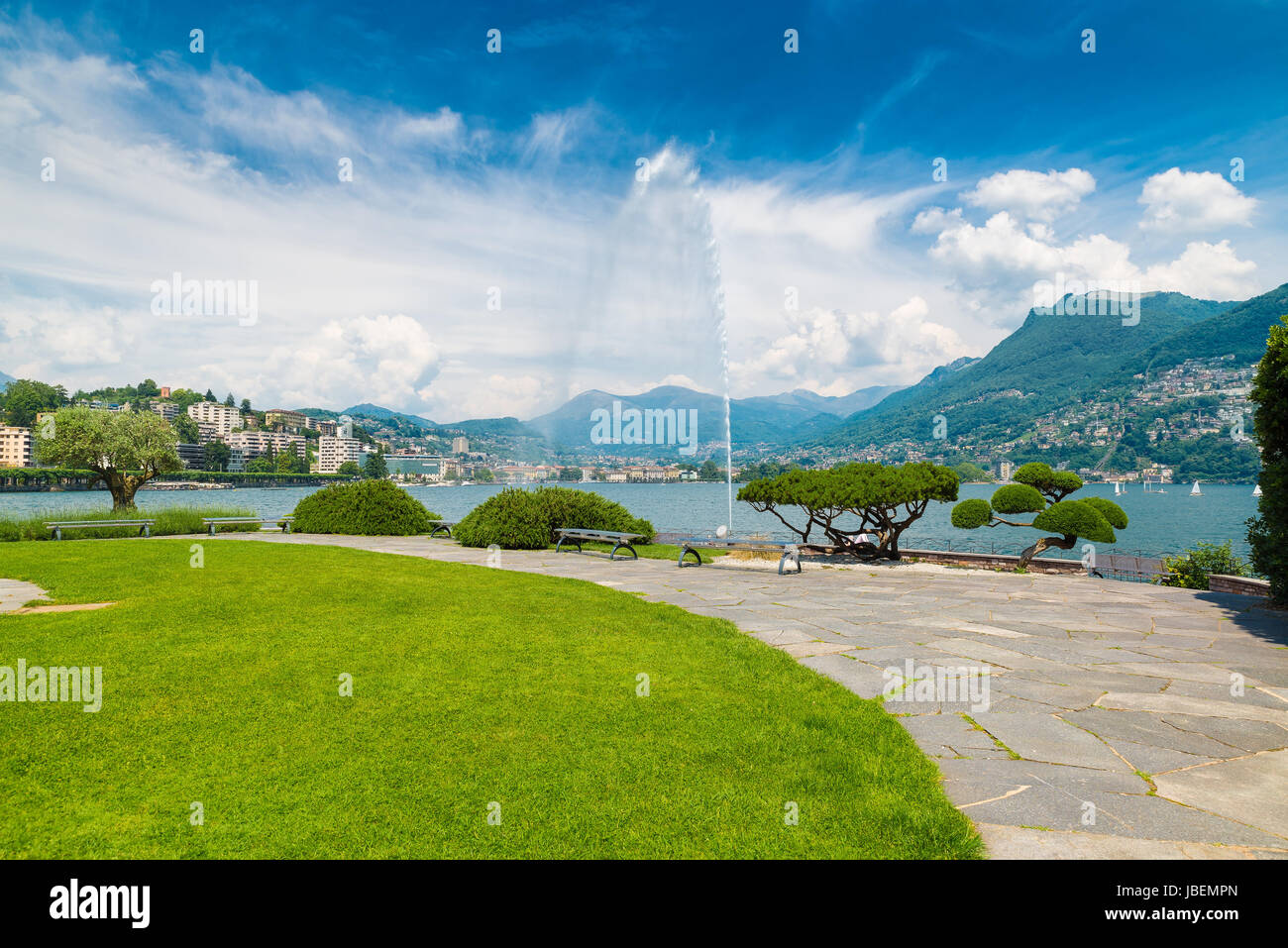 Lugano, Canton Ticino, Switzerland. Lakeside and Lake Lugano on a beautiful summer day Stock Photo