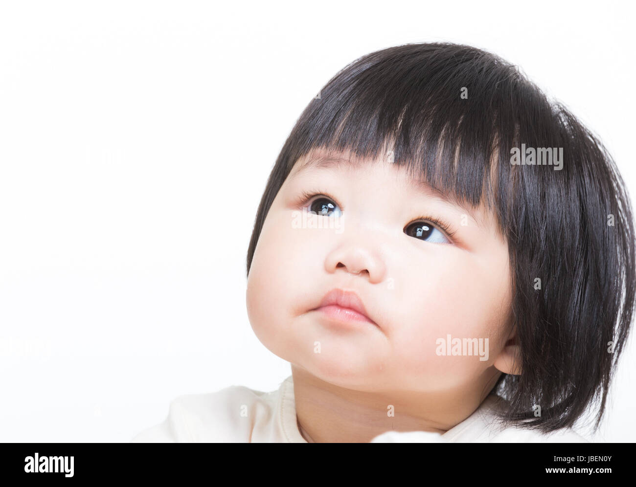 Asia little girl looking up Stock Photo - Alamy
