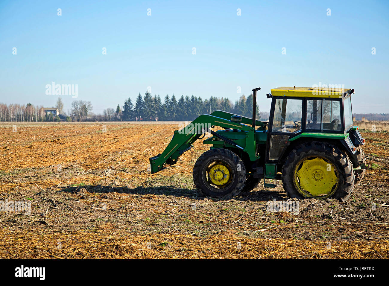 old tractor in a field Stock Photo - Alamy