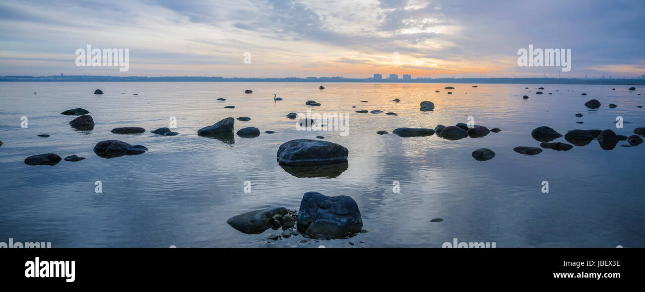 Beautiful sunrise on the sea. Views of Tallinn Stock Photo - Alamy