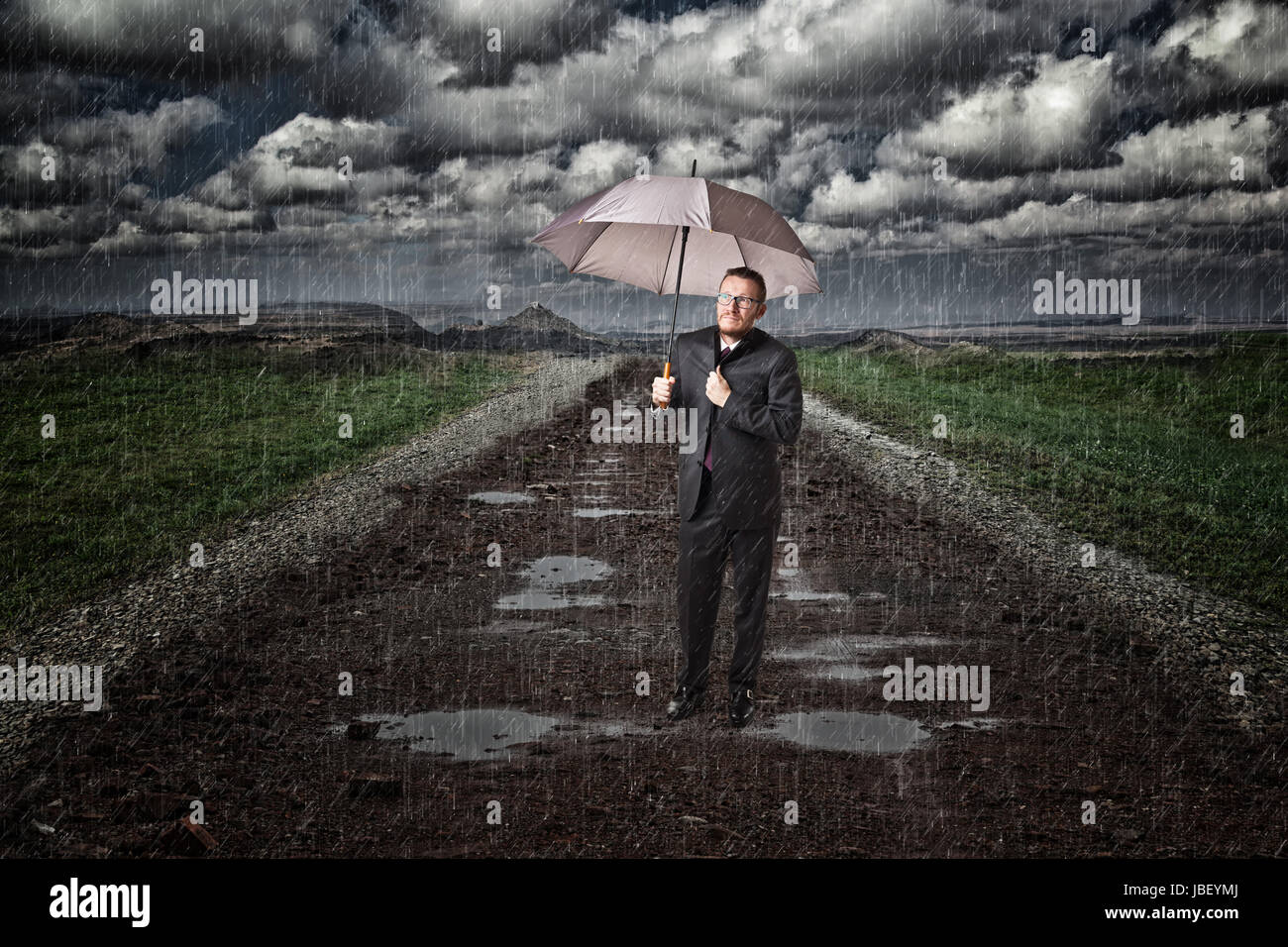 sad businessman and rainy day Stock Photo