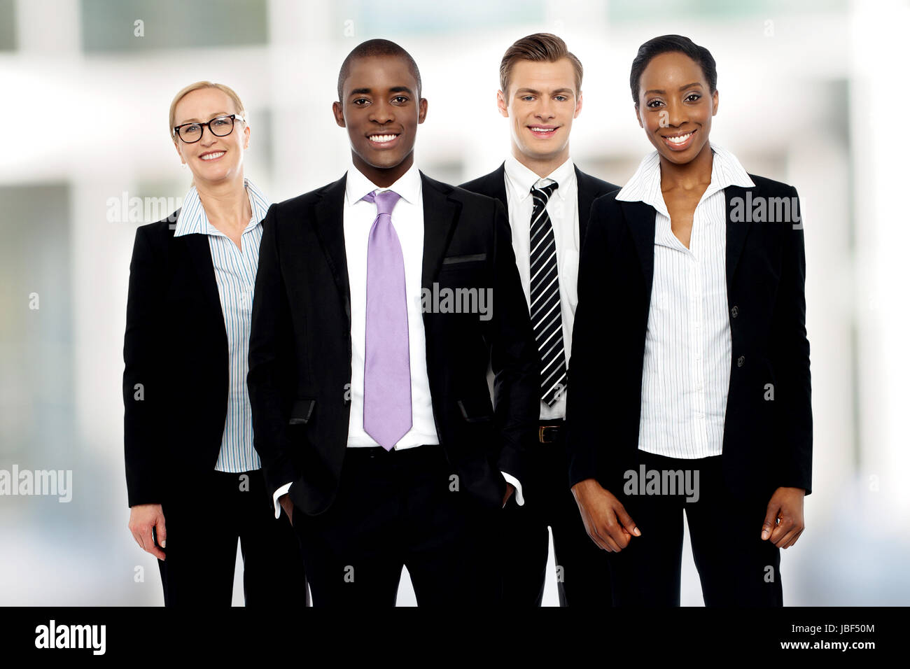 Group of business people posing together Stock Photo - Alamy