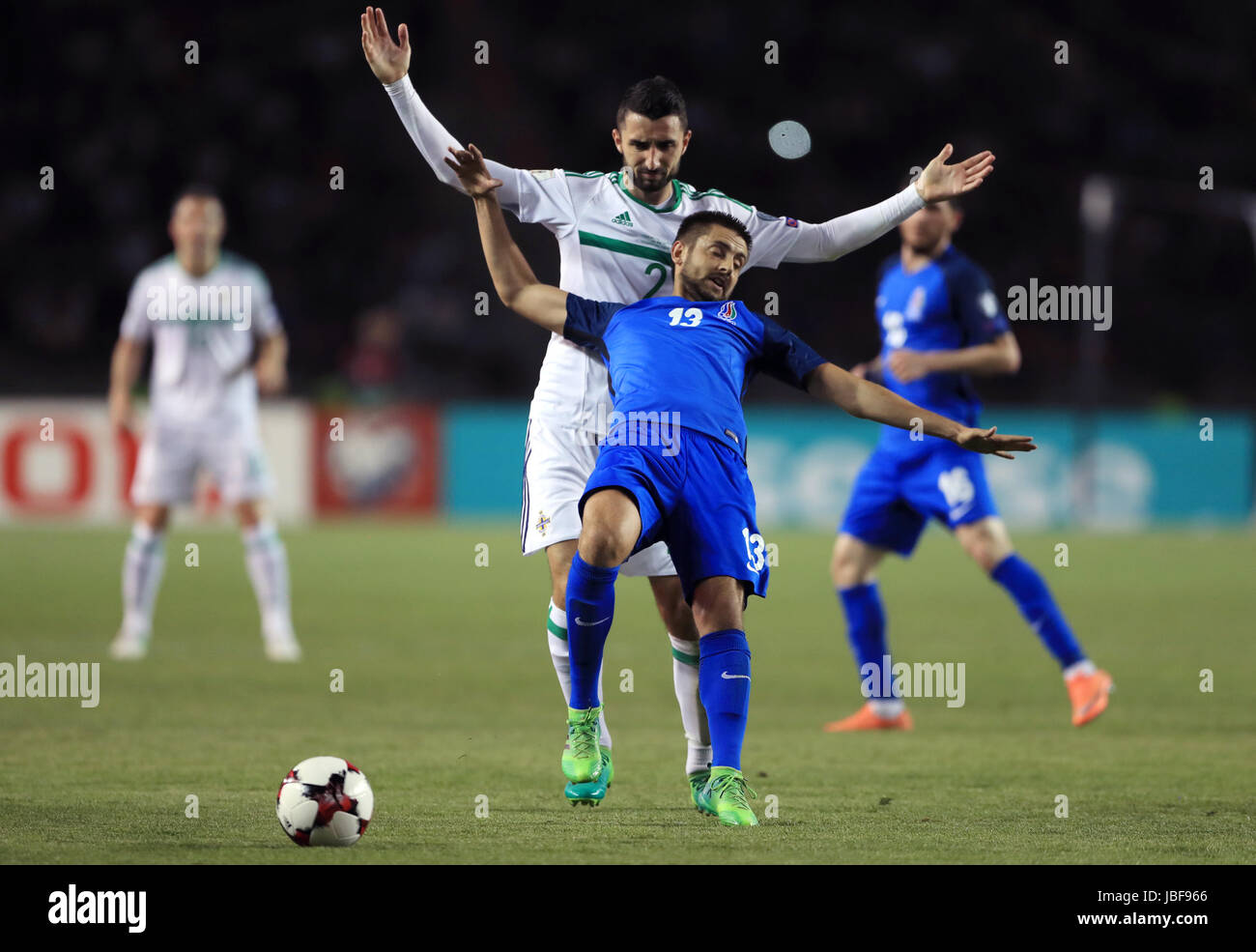 Northern Ireland's Conor McLaughlin (left) and Azerbaijan's Dimitrij Nazarov battle for the ball during the 2018 FIFA World Cup qualifying, Group C match at the Tofik Bakhramov Stadium, Baku. Stock Photo