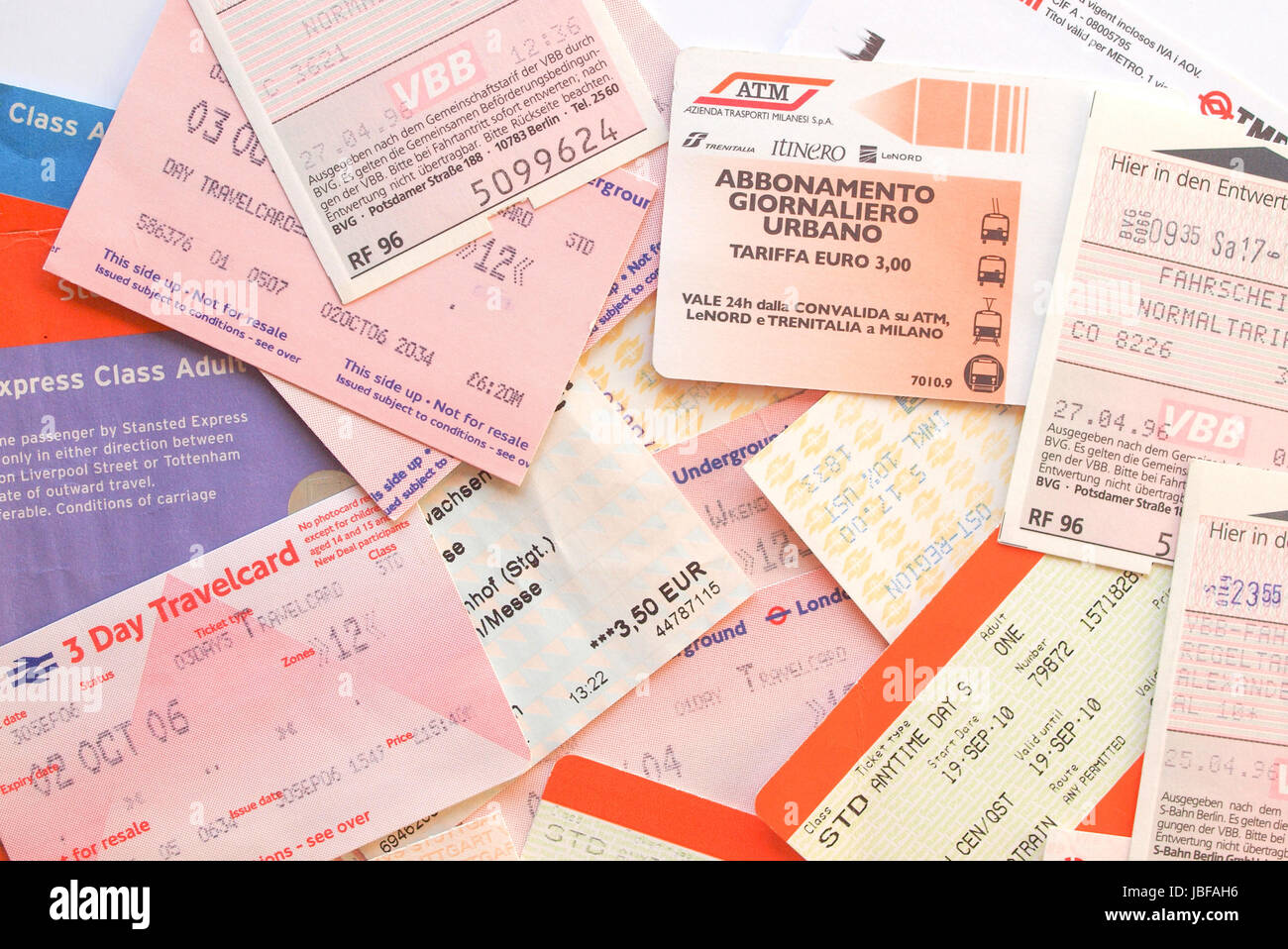 LONDON, UK - FEBRUARY 6, 2014: Set of tickets and travel cards for public transport in European cities including London Berlin Milan Stock Photo