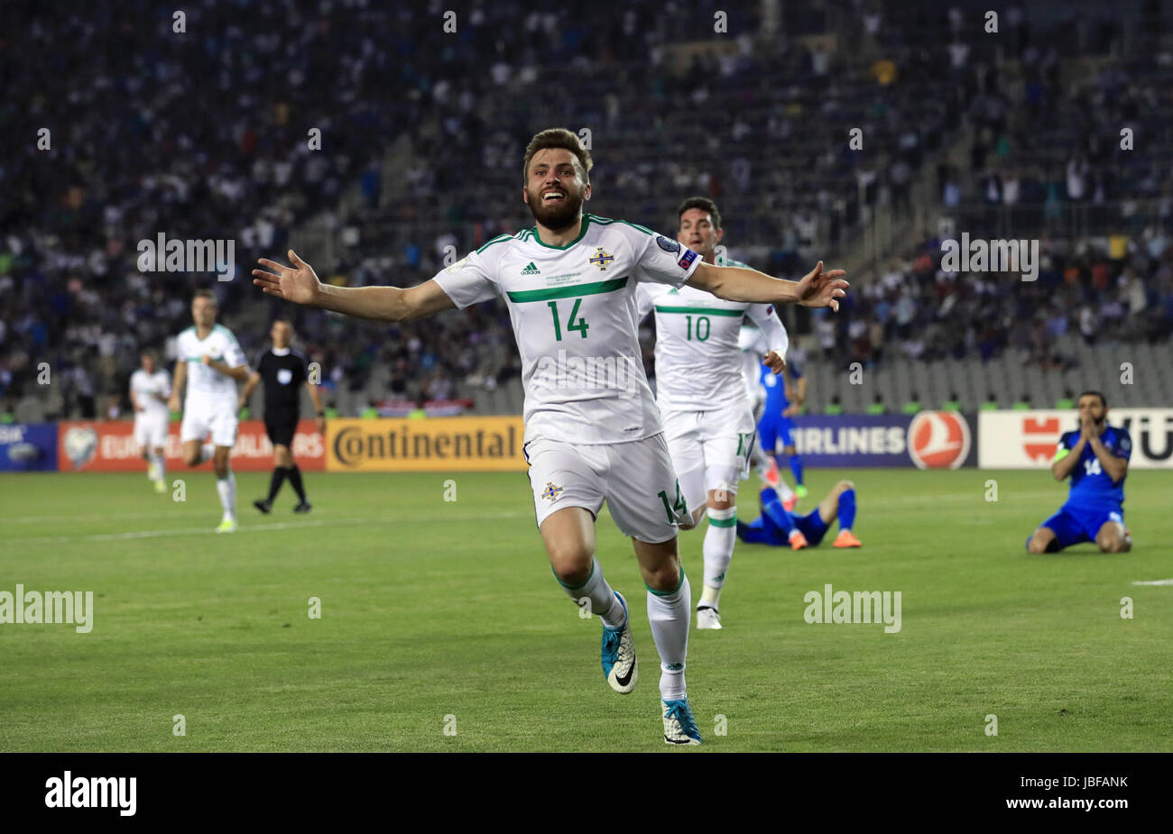 Northern Ireland's Stuart Dallas celebrates scoring his side's first goal of the game during the 2018 FIFA World Cup qualifying, Group C match at the Tofik Bakhramov Stadium, Baku. Stock Photo
