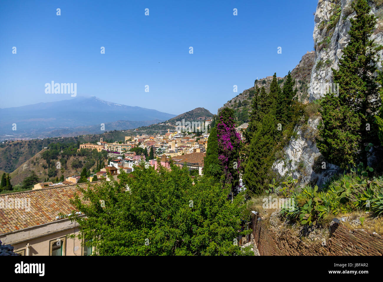 Aerial view of Taormina city and Mount Etna Volcano - Taormina, Sicily, Italy Stock Photo