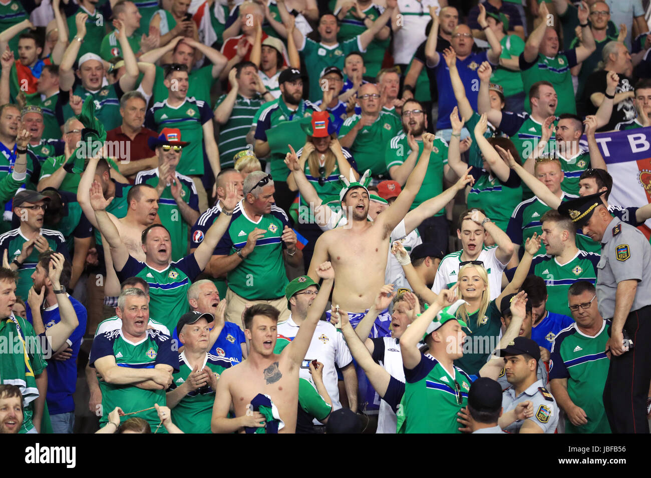 Northern Ireland fans celebrate in the stands during the 2018 FIFA World Cup qualifying, Group C match at the Tofik Bakhramov Stadium, Baku. Stock Photo