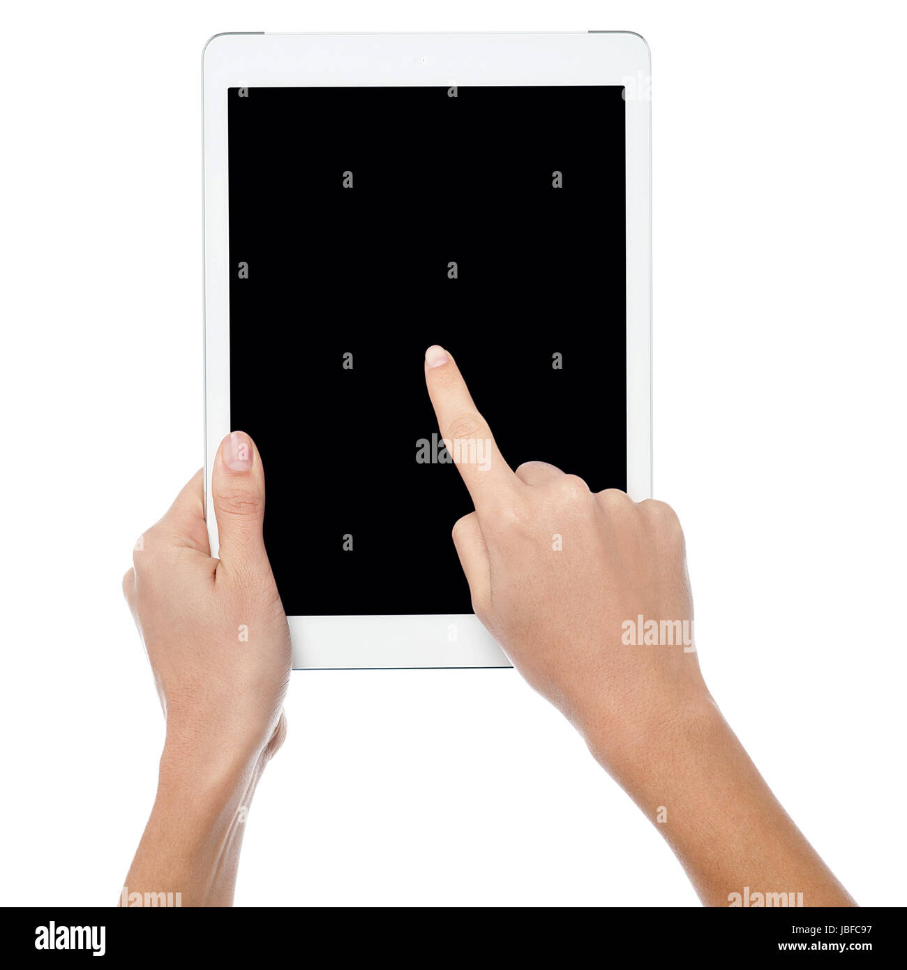 Womans finger pointing on tablet screen Stock Photo