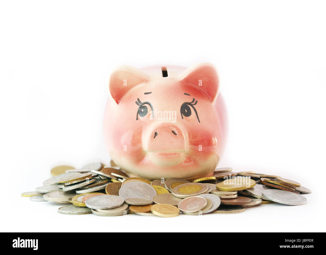 Pink piggy bank isolated on white background with coins Stock Photo - Alamy
