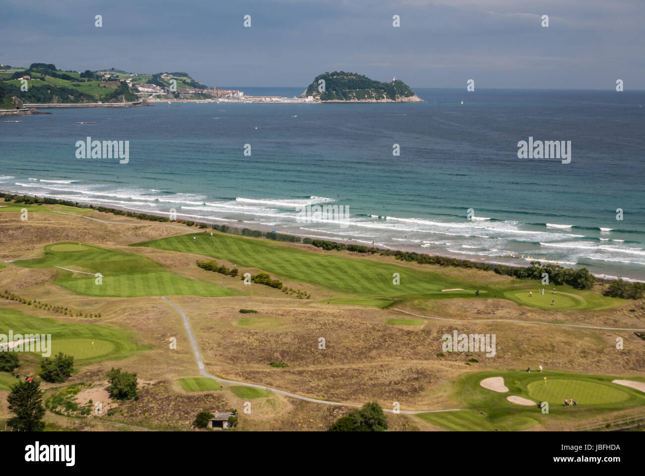 Panoramic view of Zarautz with Guetaria on the background on a bright sunny summer day. Stock Photo
