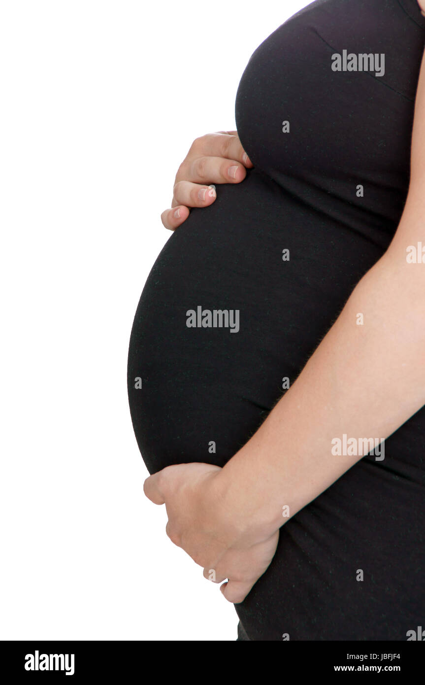 pregnant woman holding her belly Stock Photo - Alamy