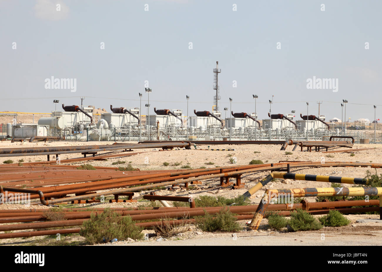 Oil and gas industry in the desert of Bahrain, Middle East Stock Photo Alamy