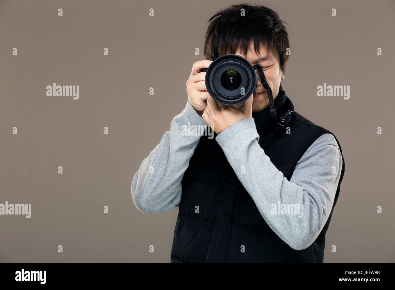 Asia male photographer Stock Photo - Alamy