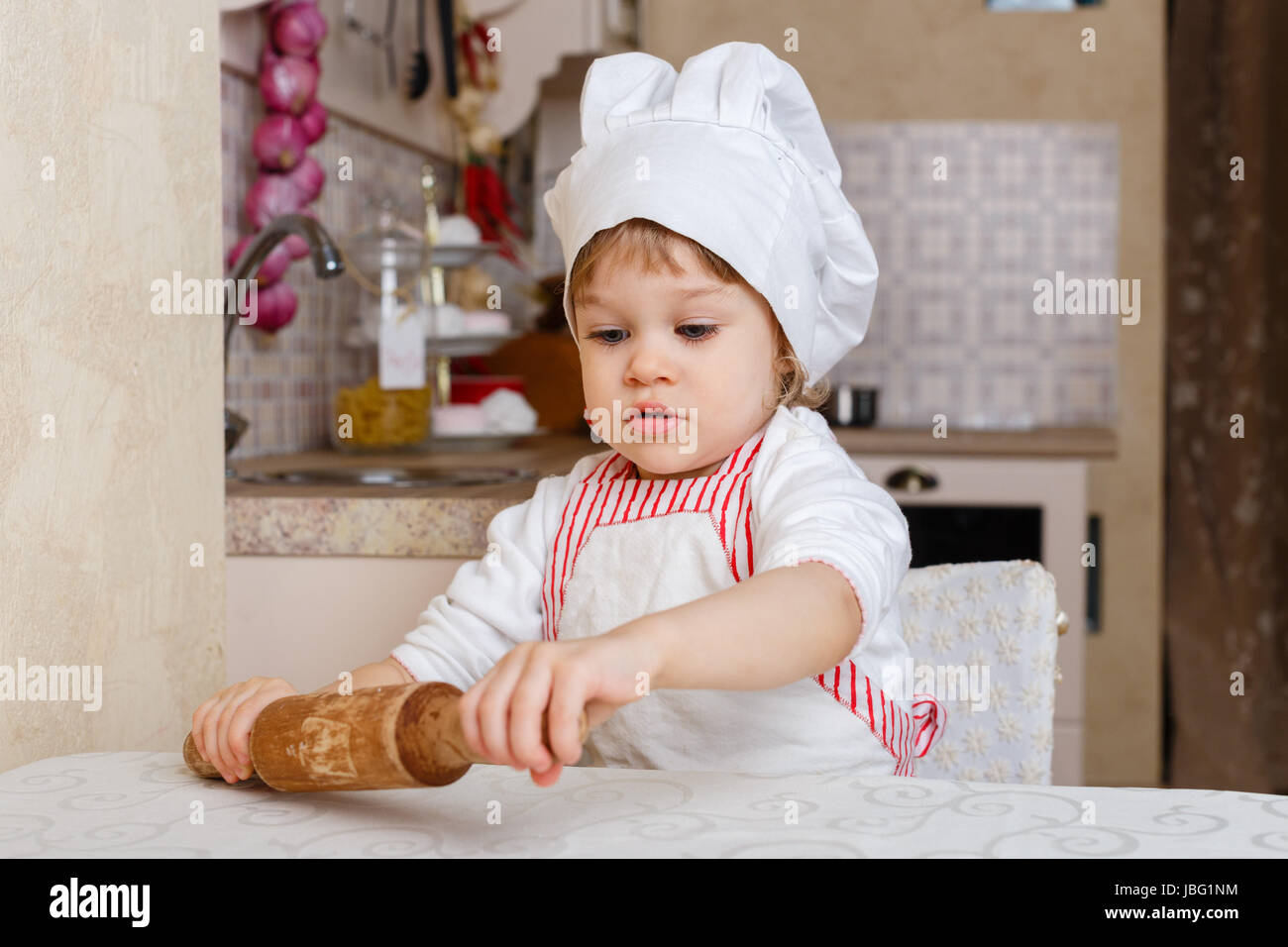 Baby girl in chef hat hi res stock photography and images Page 8