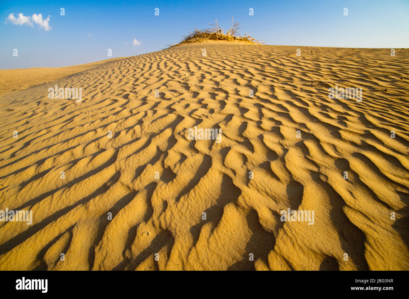 Desert landscape with blue sky Stock Photo - Alamy