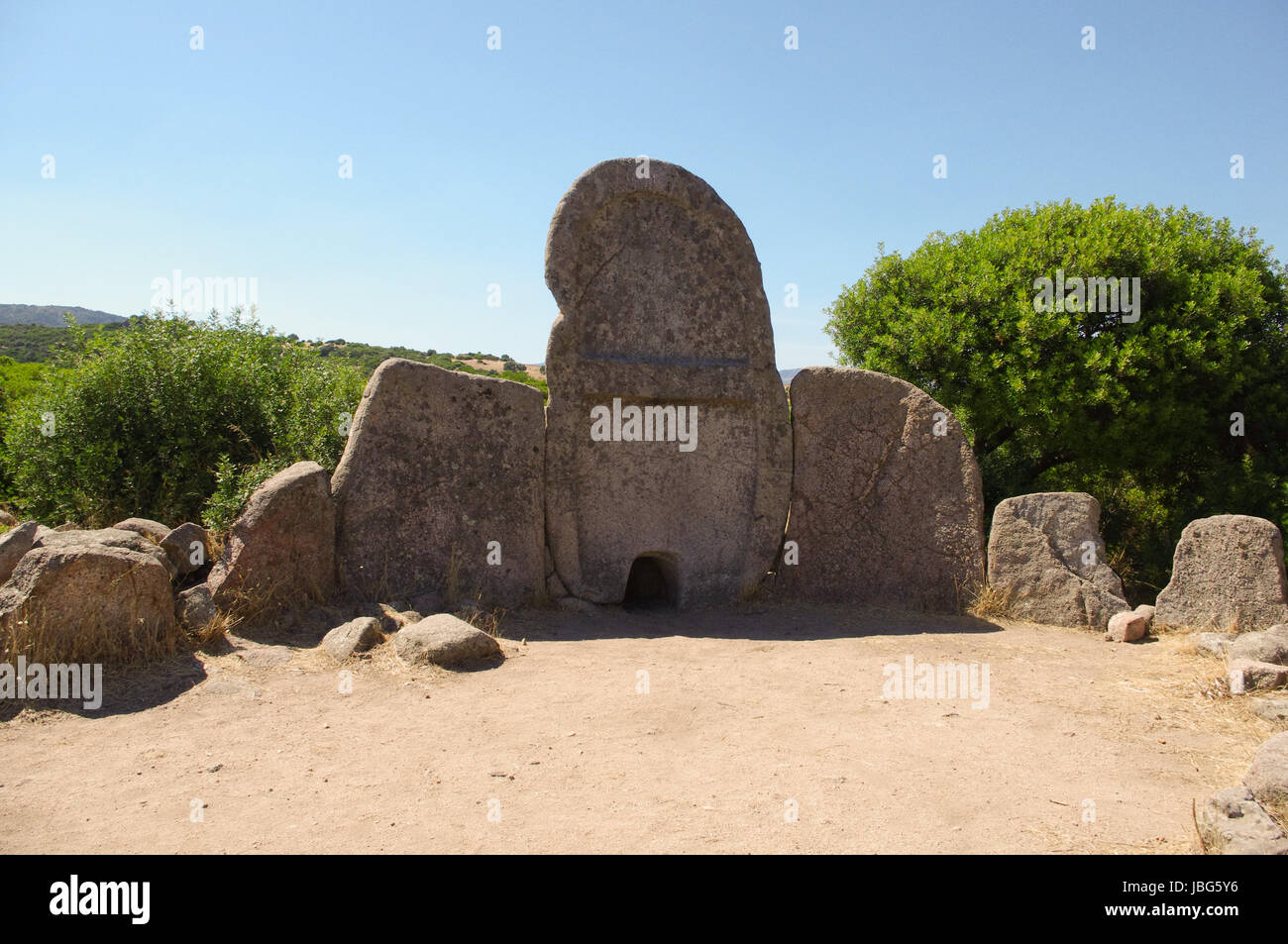 The tombs of the giants (tumbas de sos gigantes in the Sardinian language) are funerary monuments consist of collective burials belonging to the age nuragica and present throughout the island. They are building a rectangular apse, built by the large stone monoliths stuck in the ground. Stock Photo