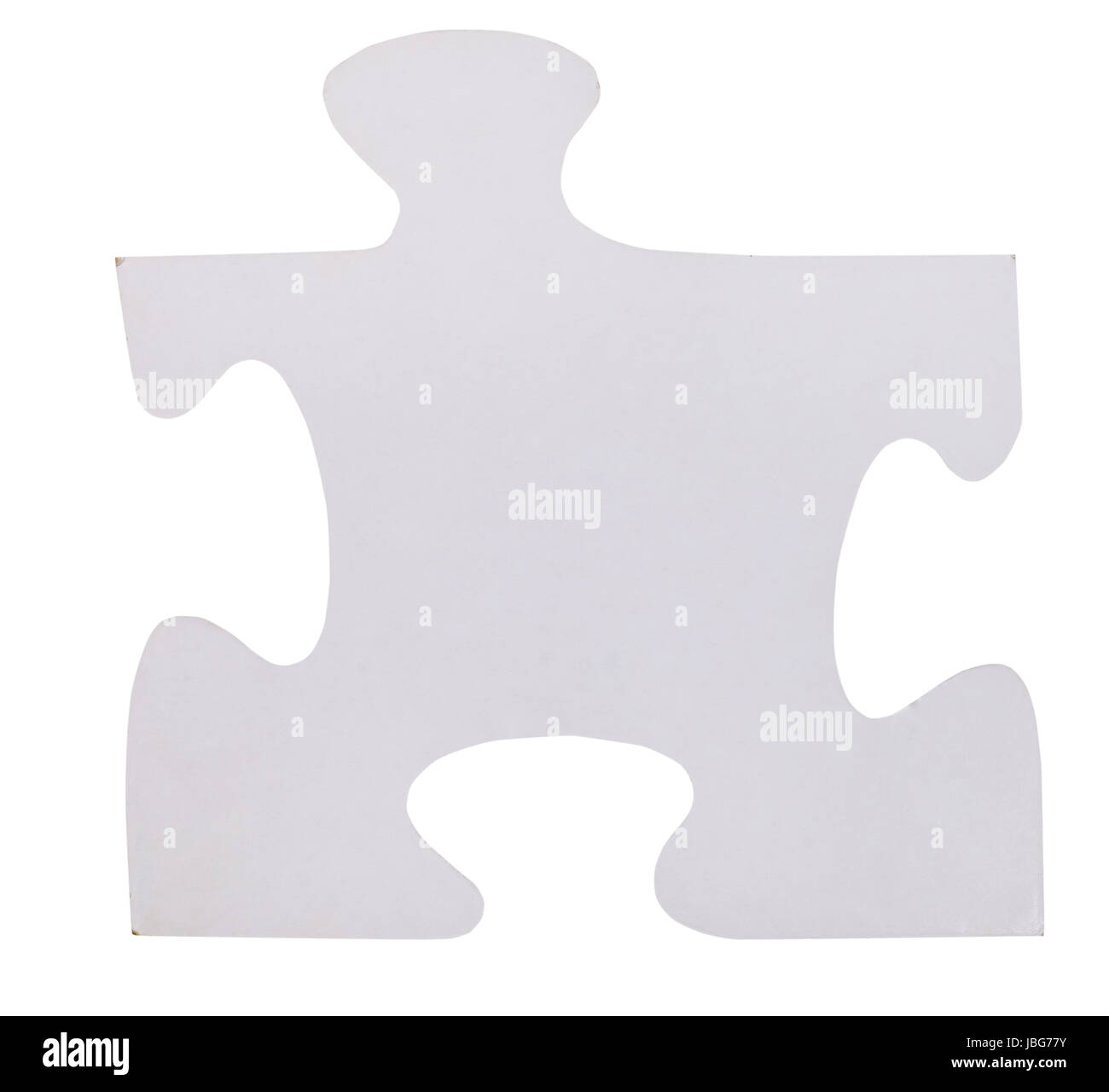 one white piece of jigsaw puzzle isolated on white background Stock ...