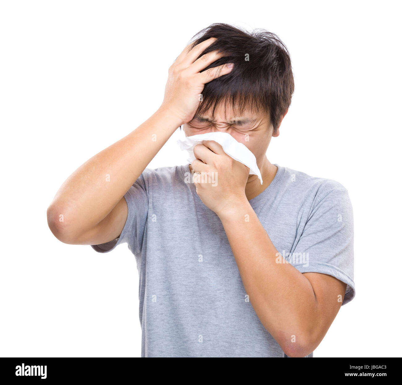 Head Exploding Sneeze Sneezing and headache of asian man Stock Photo - Alamy