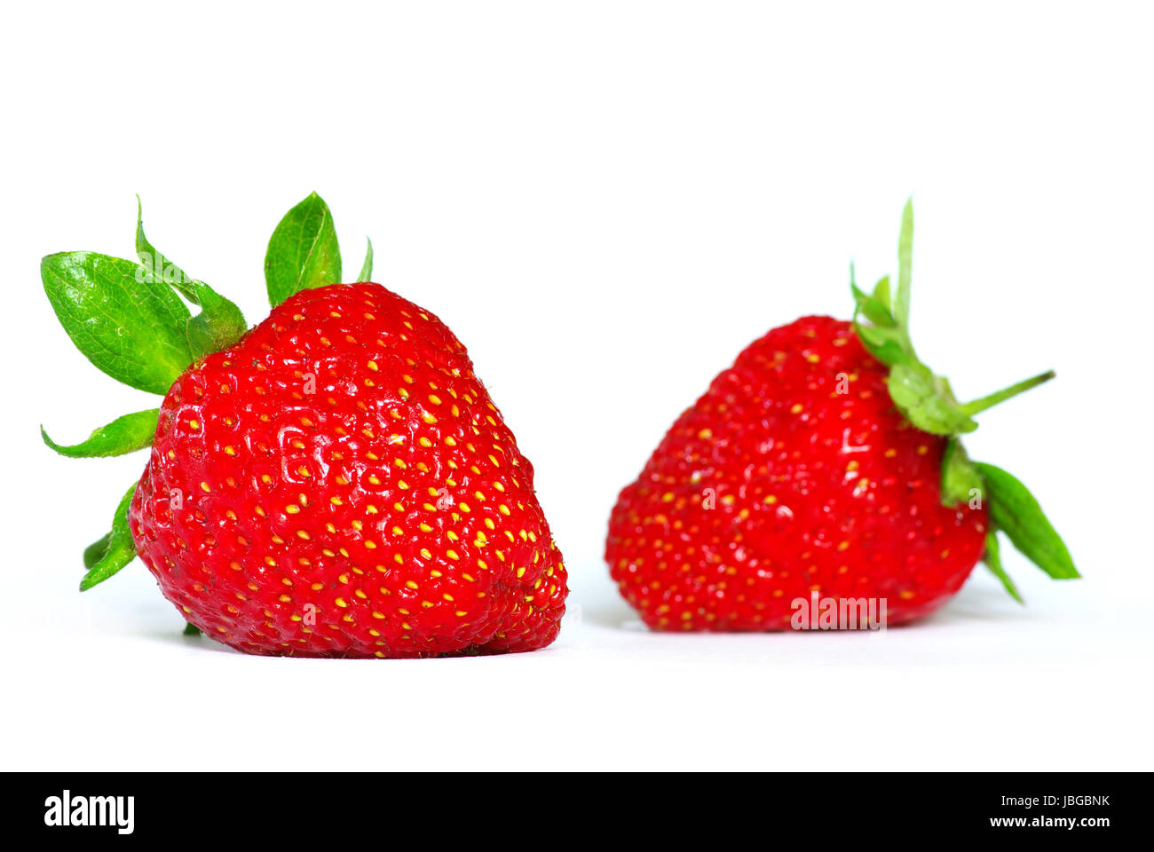 Fresh strawberries isolated on white background Stock Photo - Alamy
