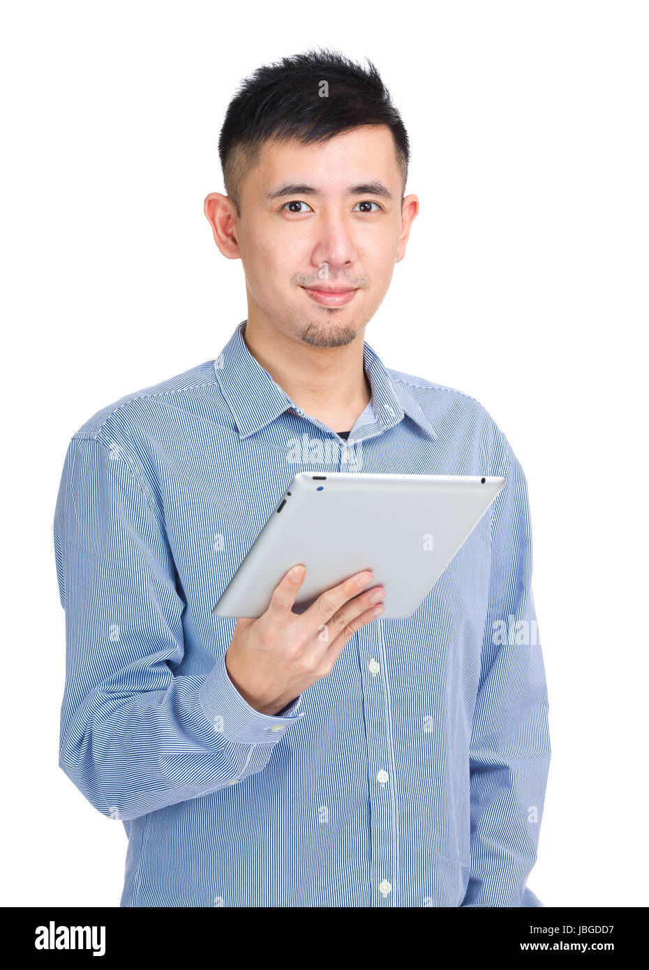 Young man using digital tablet Stock Photo