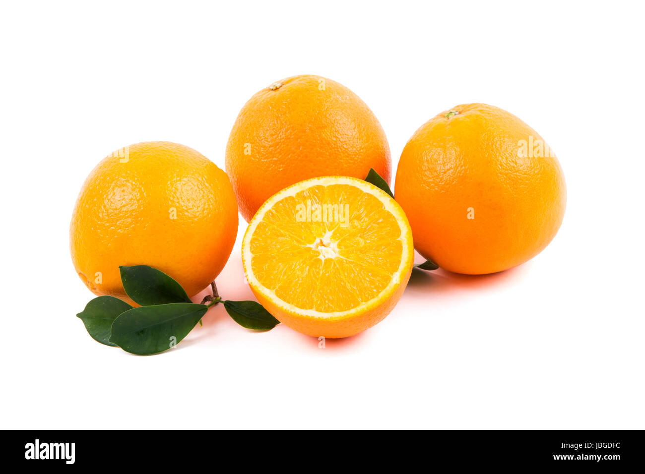 fresh oranges with leaves Stock Photo Alamy