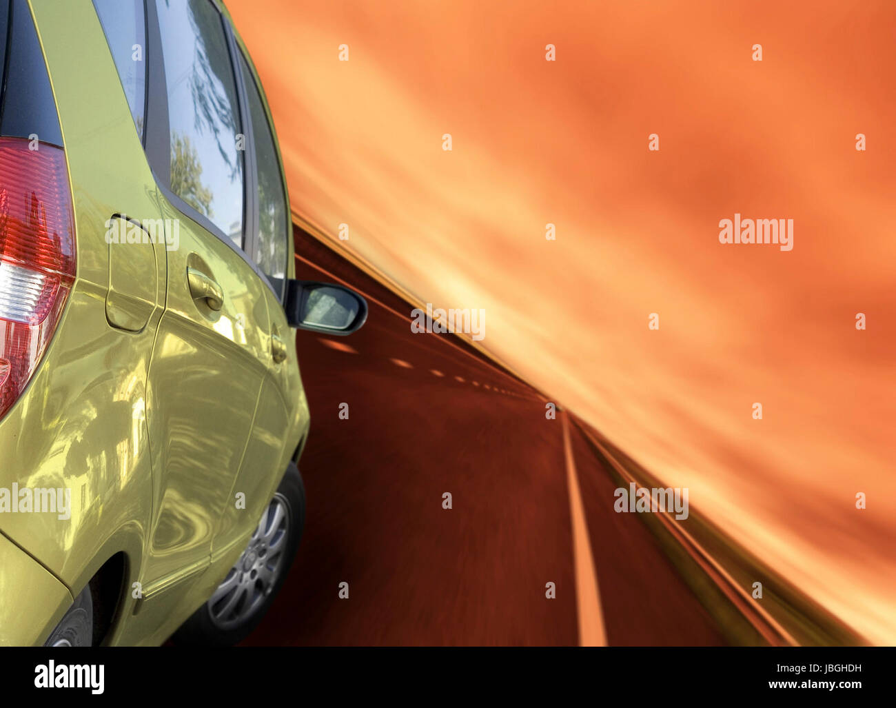 Fast car on the highway. Back view. Stock Photo