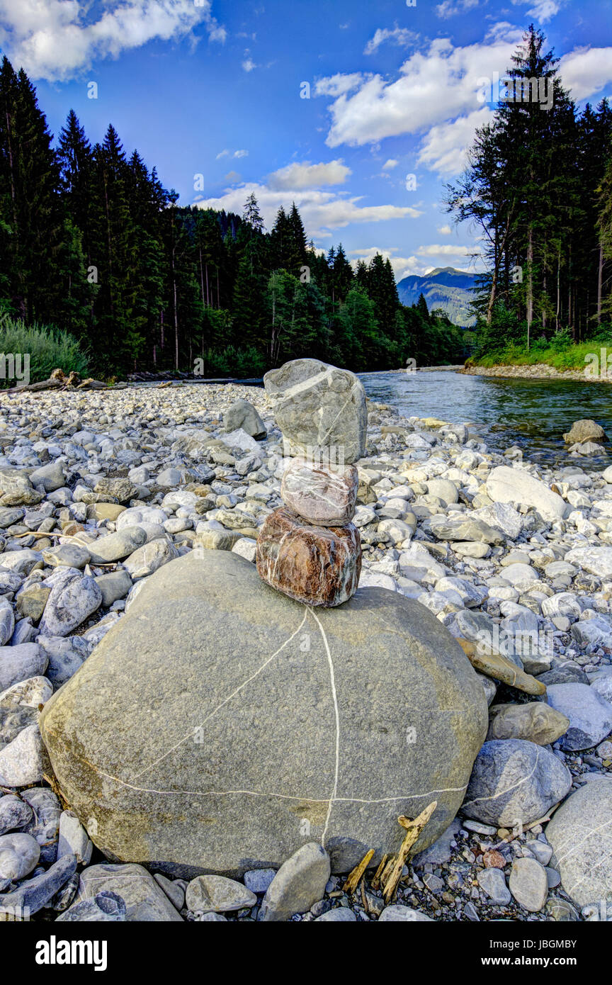 stone tower on the mountain river Stock Photo