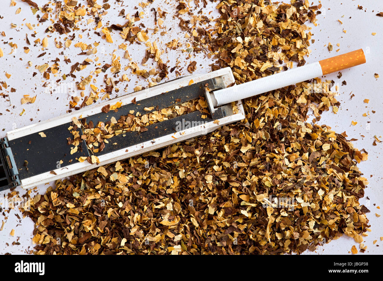 cigarette making machine and cigarette tube Stock Photo