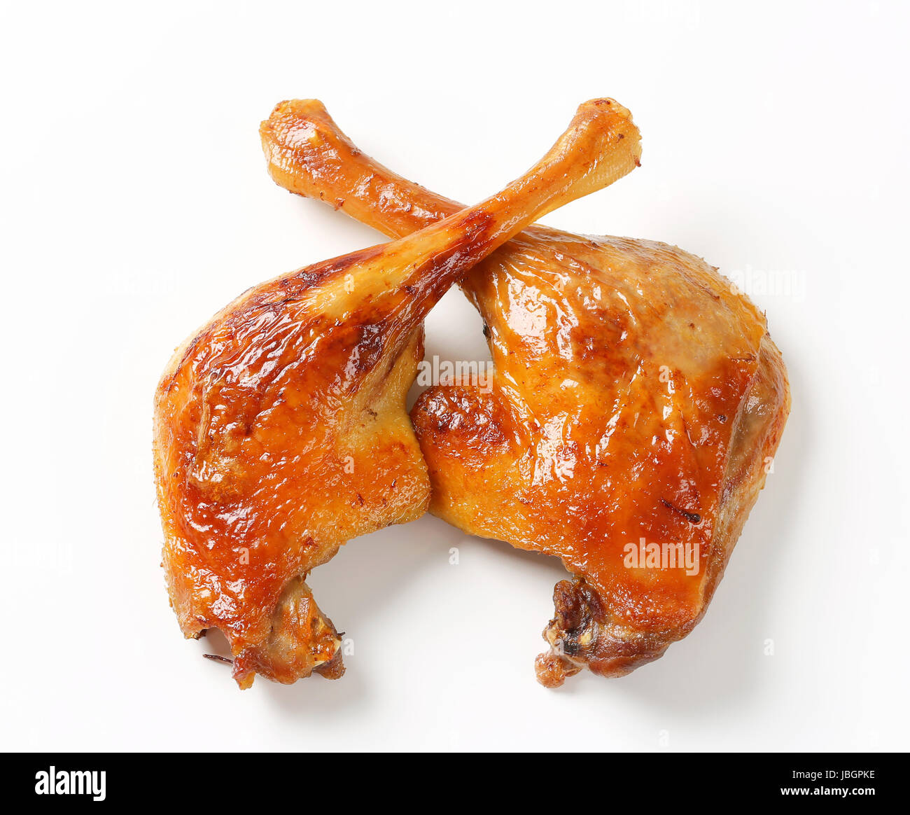 Roast duck legs with crispy skin Stock Photo - Alamy