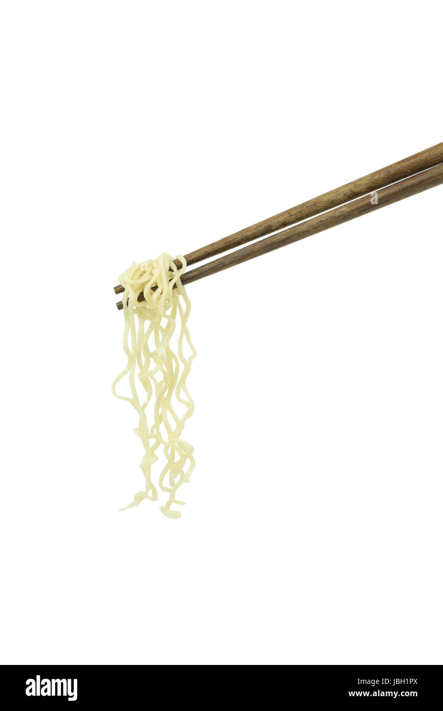 chopsticks holding oriental noodles isolated on a white background Stock Photo
