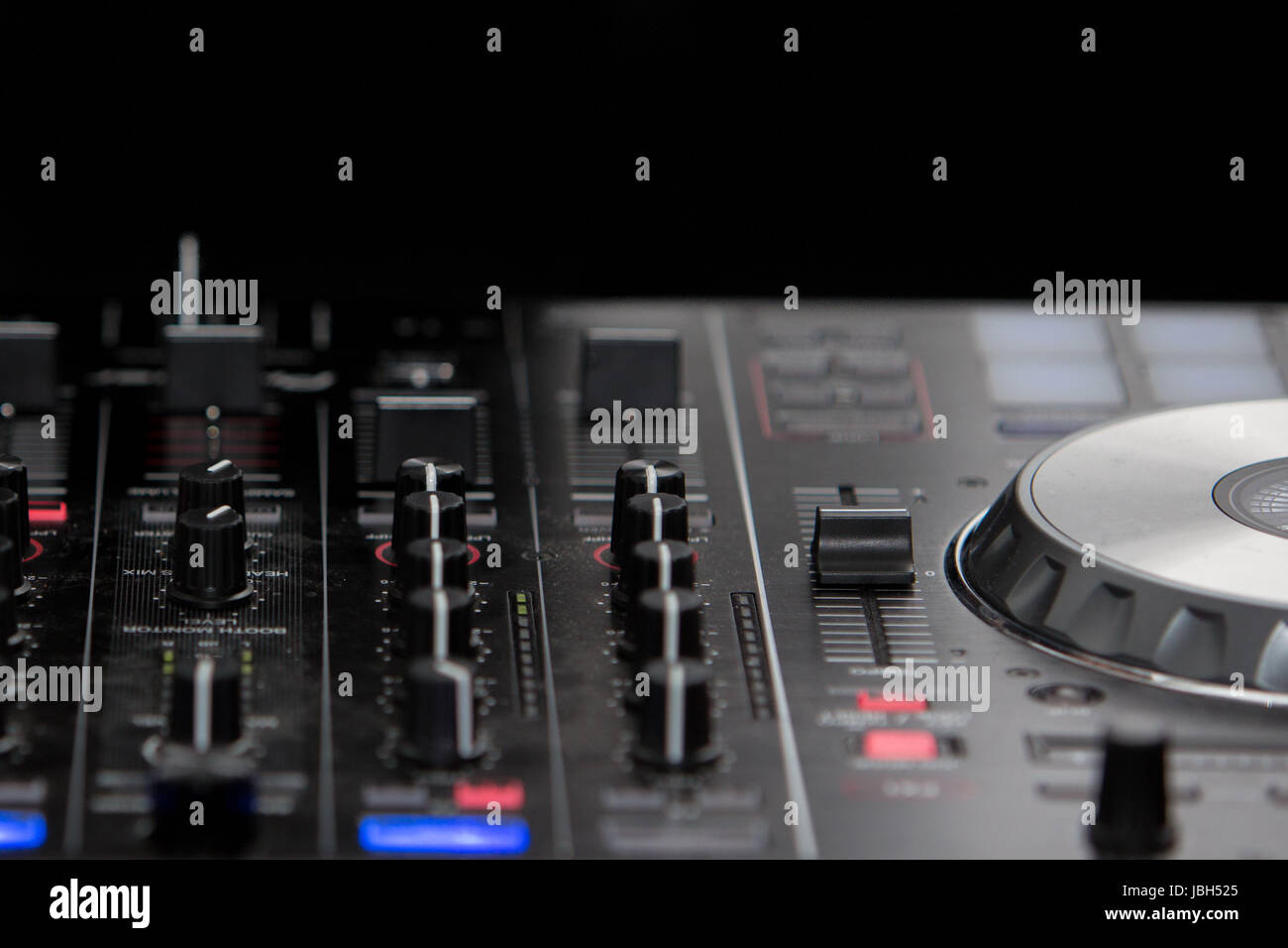 Audio mixer mixing board fader and DJ MP3 player with speed variator Stock  Photo - Alamy