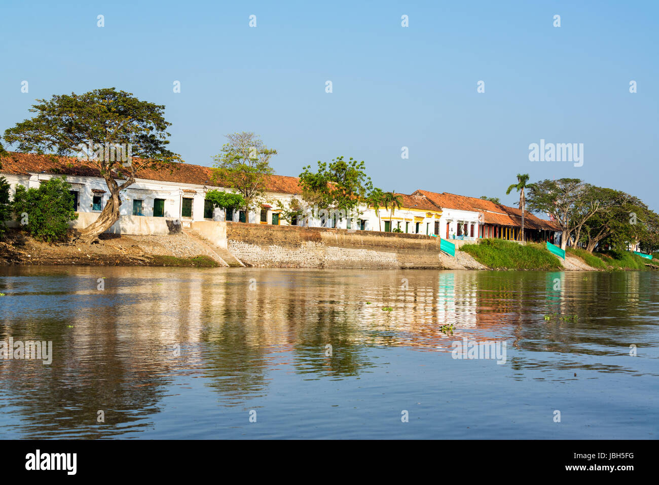 Historic colonial city of Mompox, Colombia reflected in the Magdalena River Stock Photo