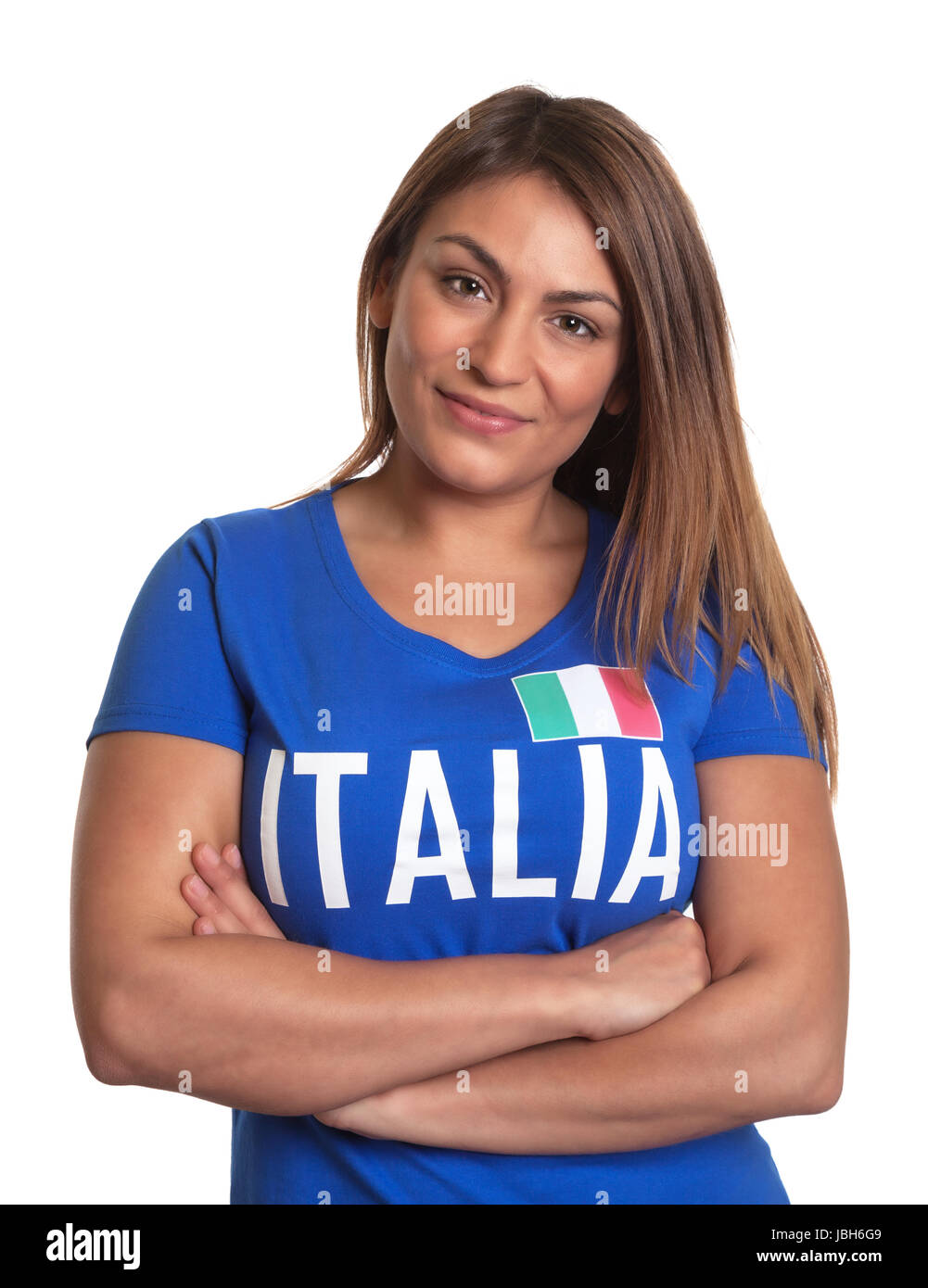 Beautiful Italian Girl With Crossed Arms In A Blue Soccer Jersey Looking At Camera On An
