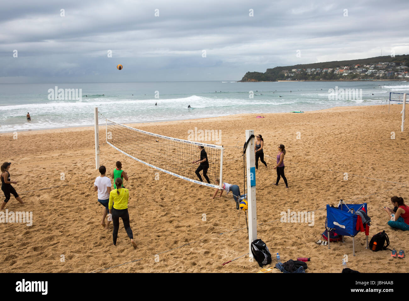 Playing and learning beach volleyball on Manly beach in Sydney,Australia Stock Photo