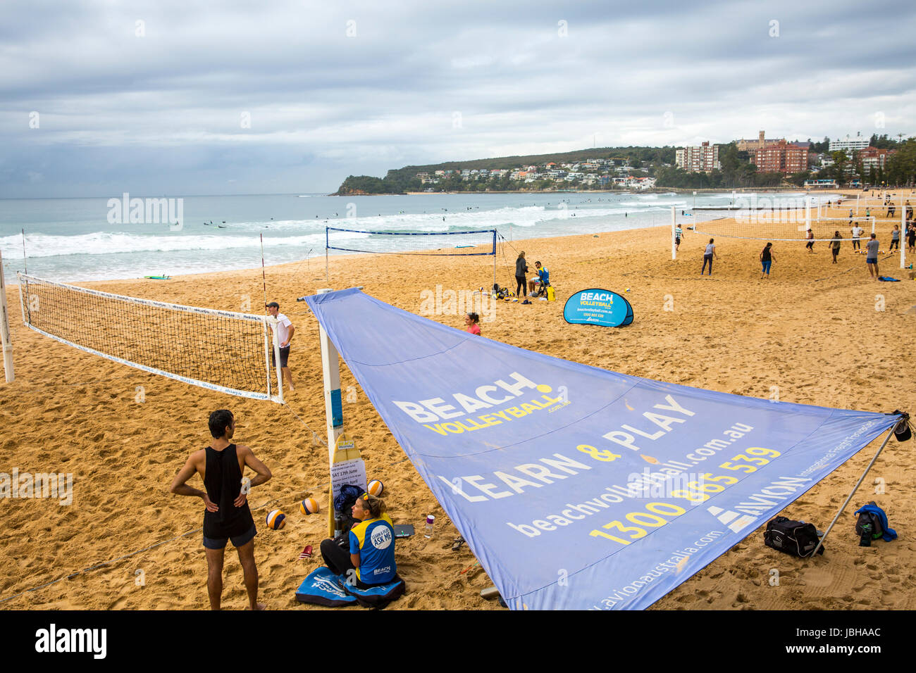 Playing and learning beach volleyball on Manly beach in Sydney,Australia Stock Photo