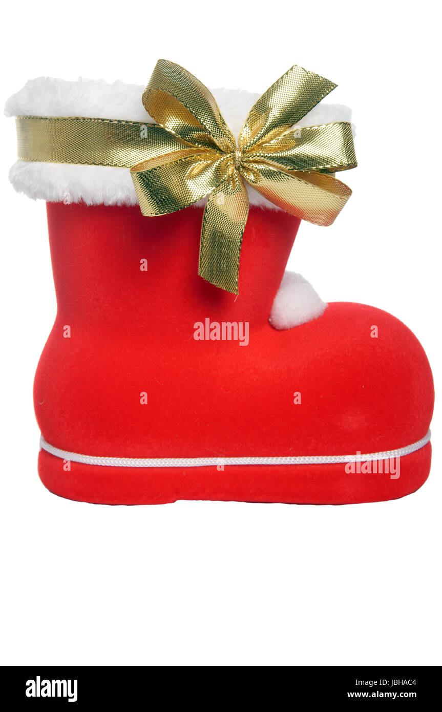 Santa Claus Boot with golden ribbon Stock Photo - Alamy