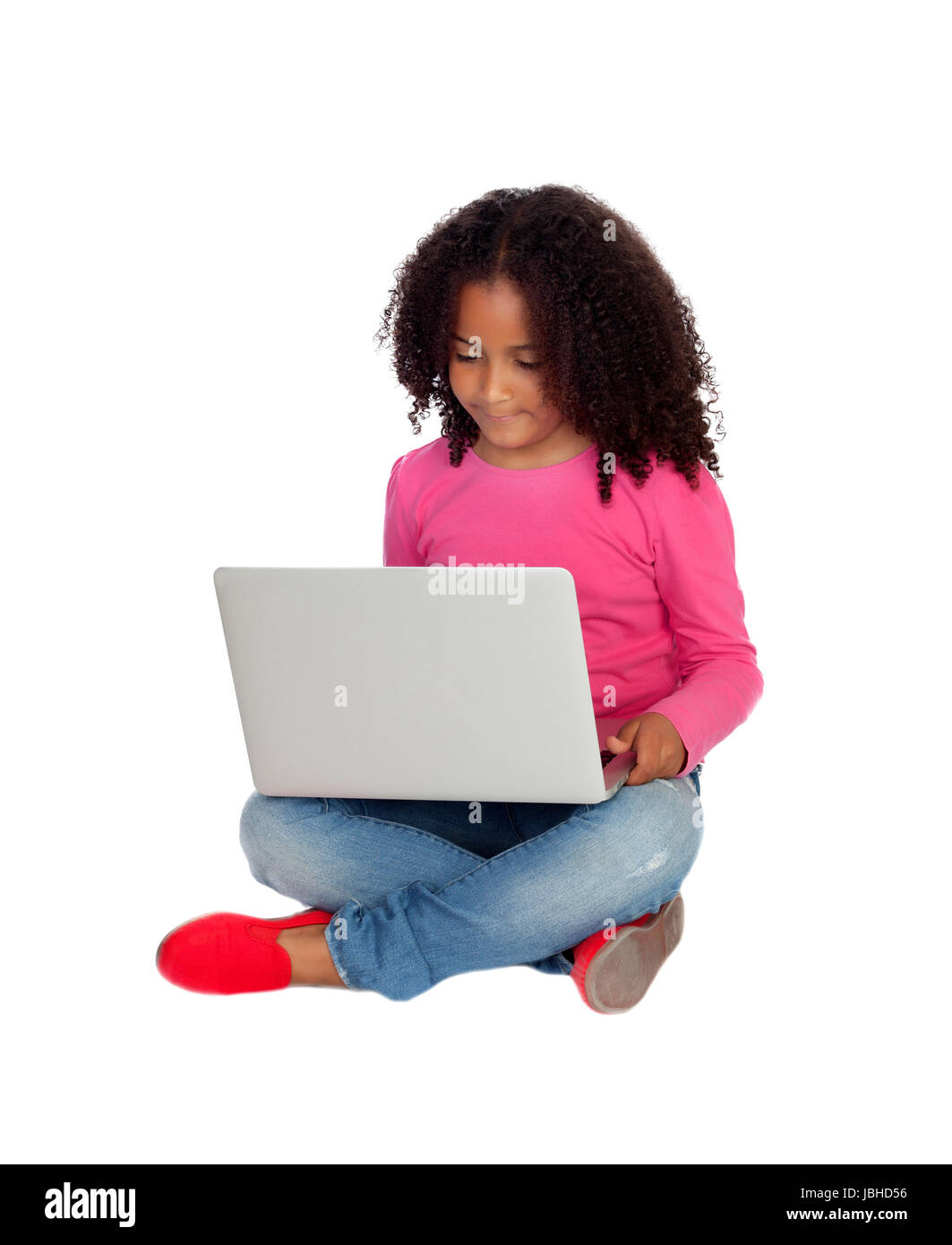 African little girl with a laptop isolated on a white background Stock ...