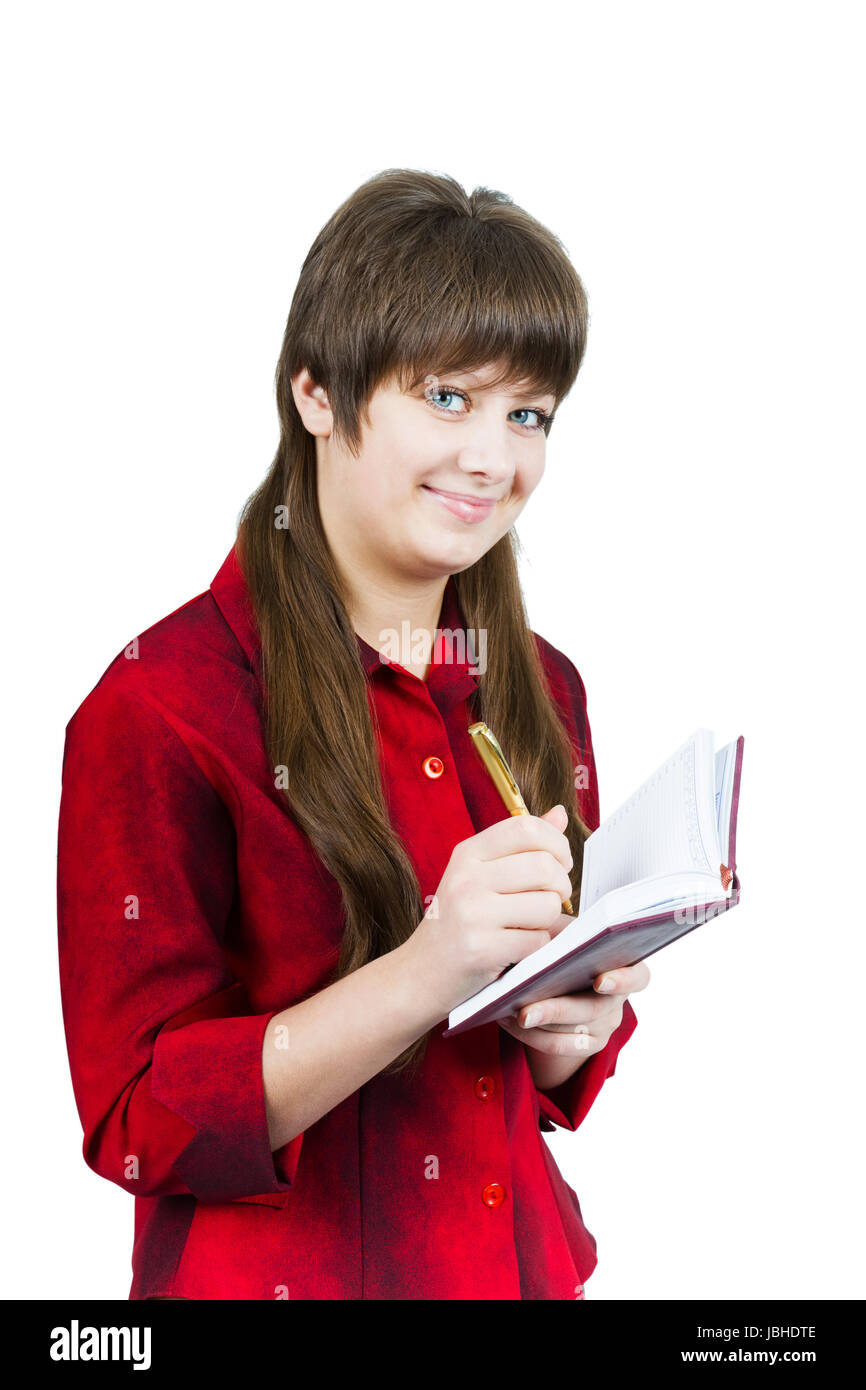 Beautiful young girl with notebook and pen on a white background Stock ...
