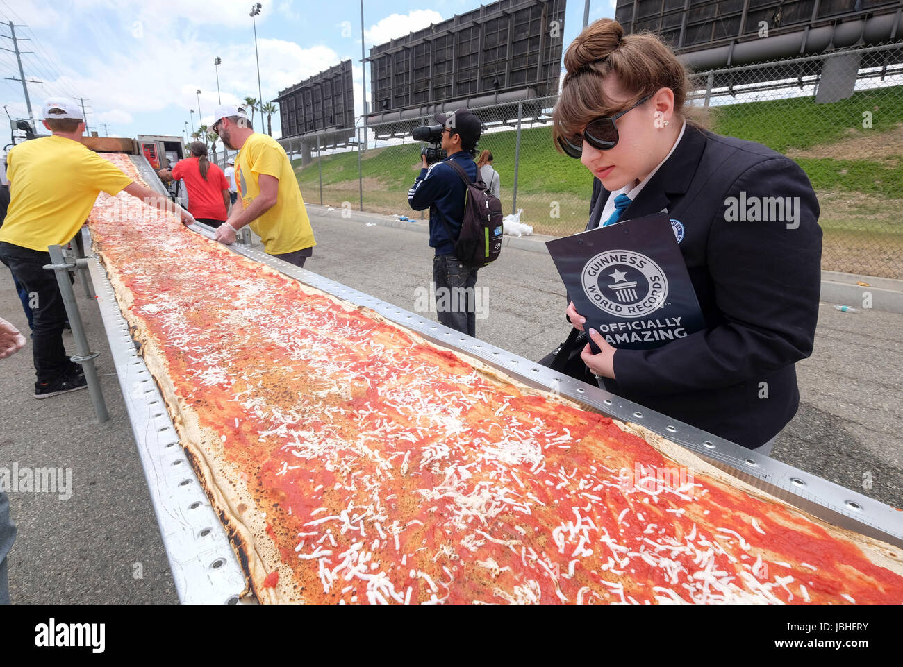 Los Angeles, Italy. 18th May, 2016. An officer from the Guinness World ...