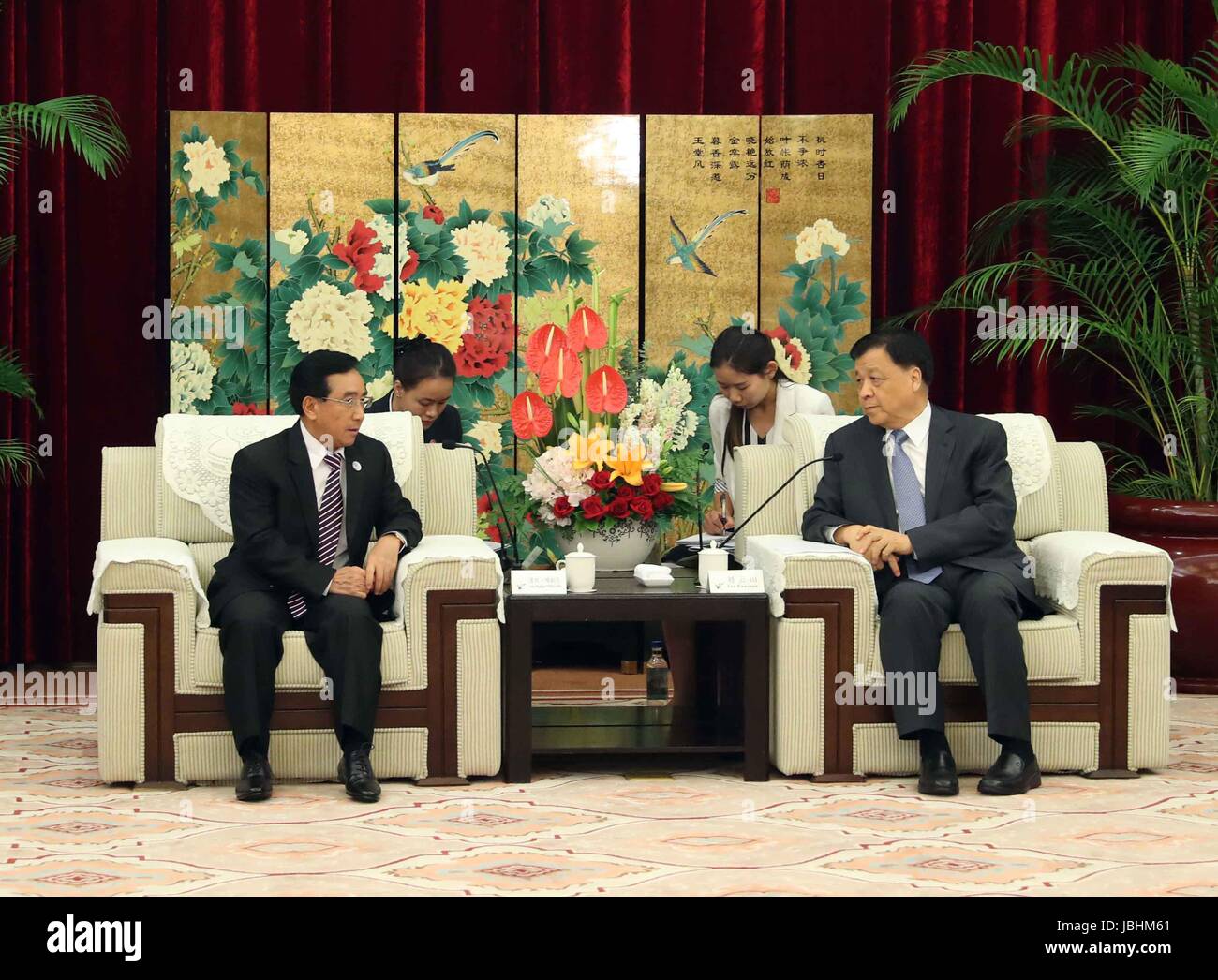 Fuzhou, China's Fujian Province. 11th June, 2017. Liu Yunshan (R), a member of the Standing Committee of the Political Bureau of the Communist Party of China (CPC) Central Committee, meets with Phankham Viphavanh, a member of the Political Bureau of the Lao People's Revolutionary Party (PRP) Central Committee and vice president of Laos, in Fuzhou, capital of southeast China's Fujian Province, June 11, 2017. Credit: Liu Weibing/Xinhua/Alamy Live News Stock Photo
