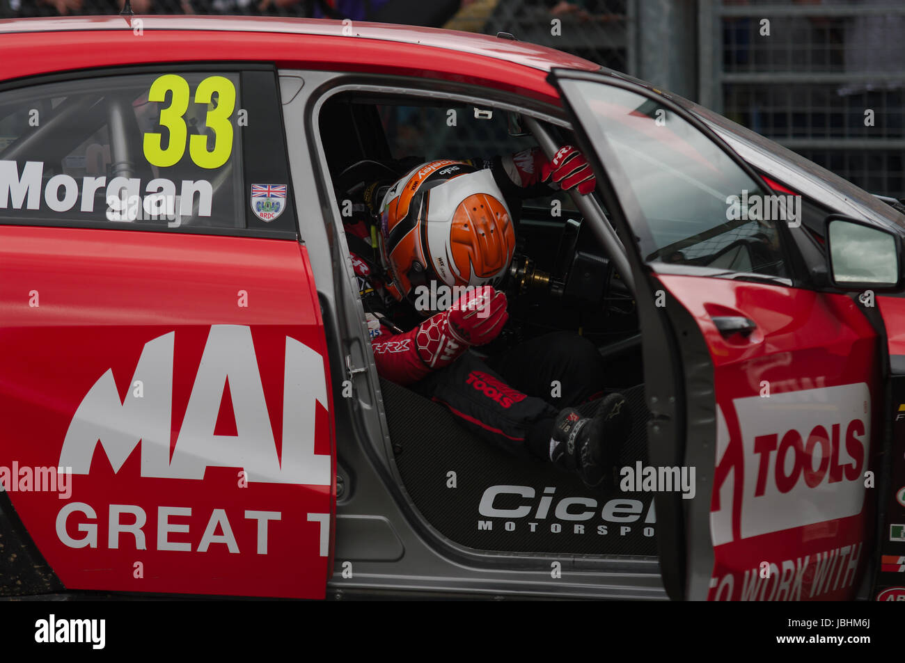 Croft Circuit, England, 11th June 2017. Adam Morgan getting out of his ...