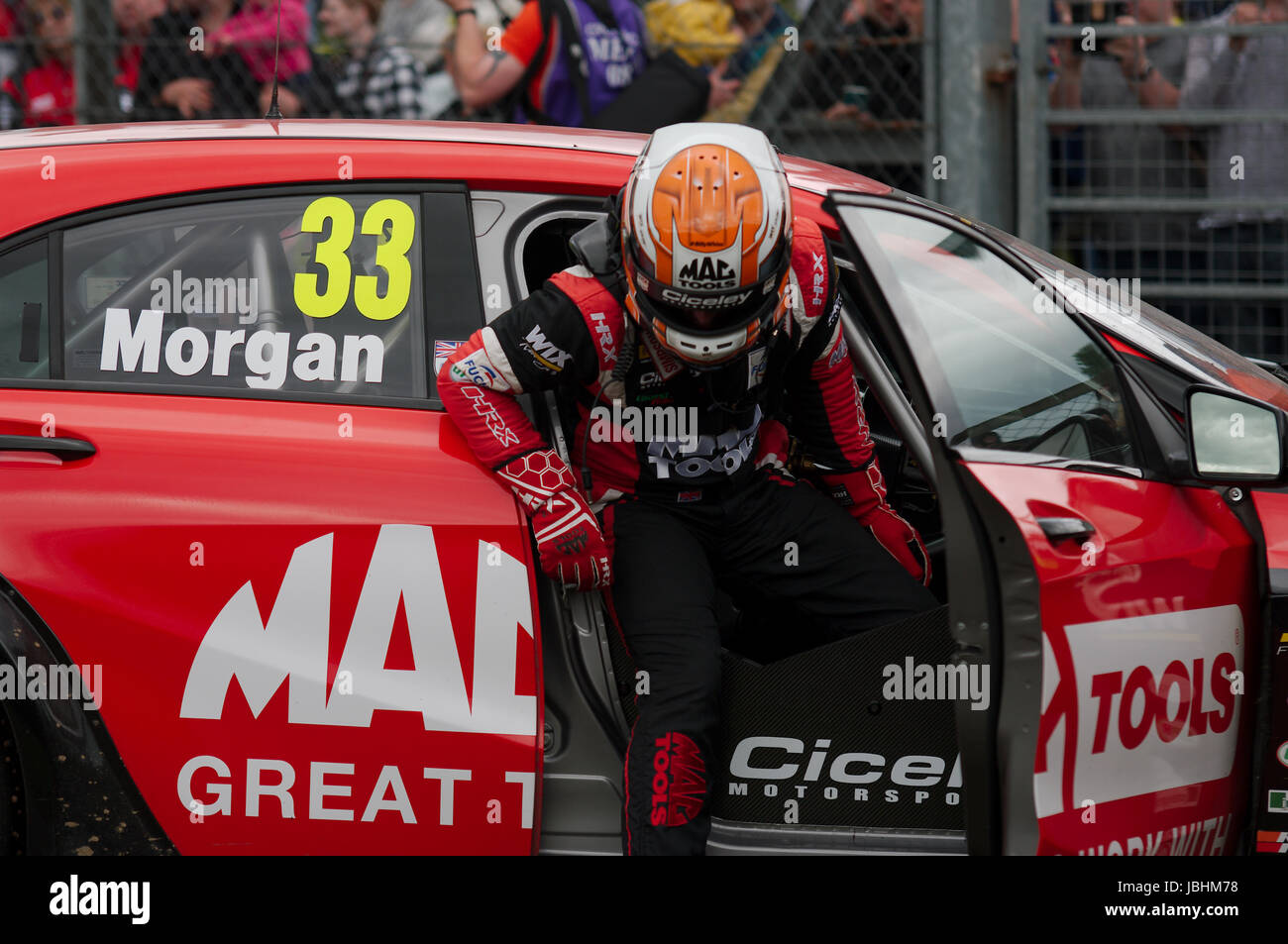 Croft Circuit, England, 11th June 2017. Adam Morgan getting out of his ...