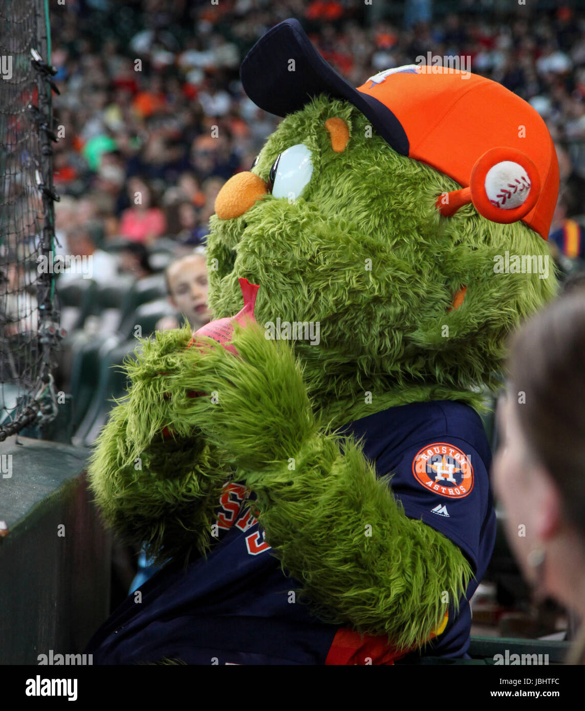 Houston, TX, USA. 11th June, 2017. The Houston Astros mascot Orbit uses a whoopee cushion as a prank during the MLB game between the Los Angeles Angels and the Houston Astros at Minute Maid Park in Houston, TX. John Glaser/CSM/Alamy Live News Stock Photo