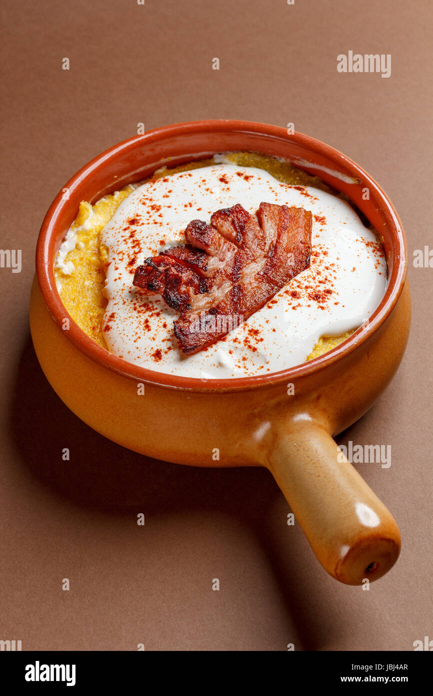 Romanian traditional dish of polenta with cheese Stock Photo Alamy