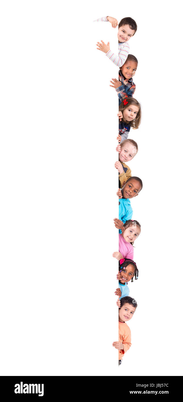 Group of children with a white board isolated in white Stock Photo