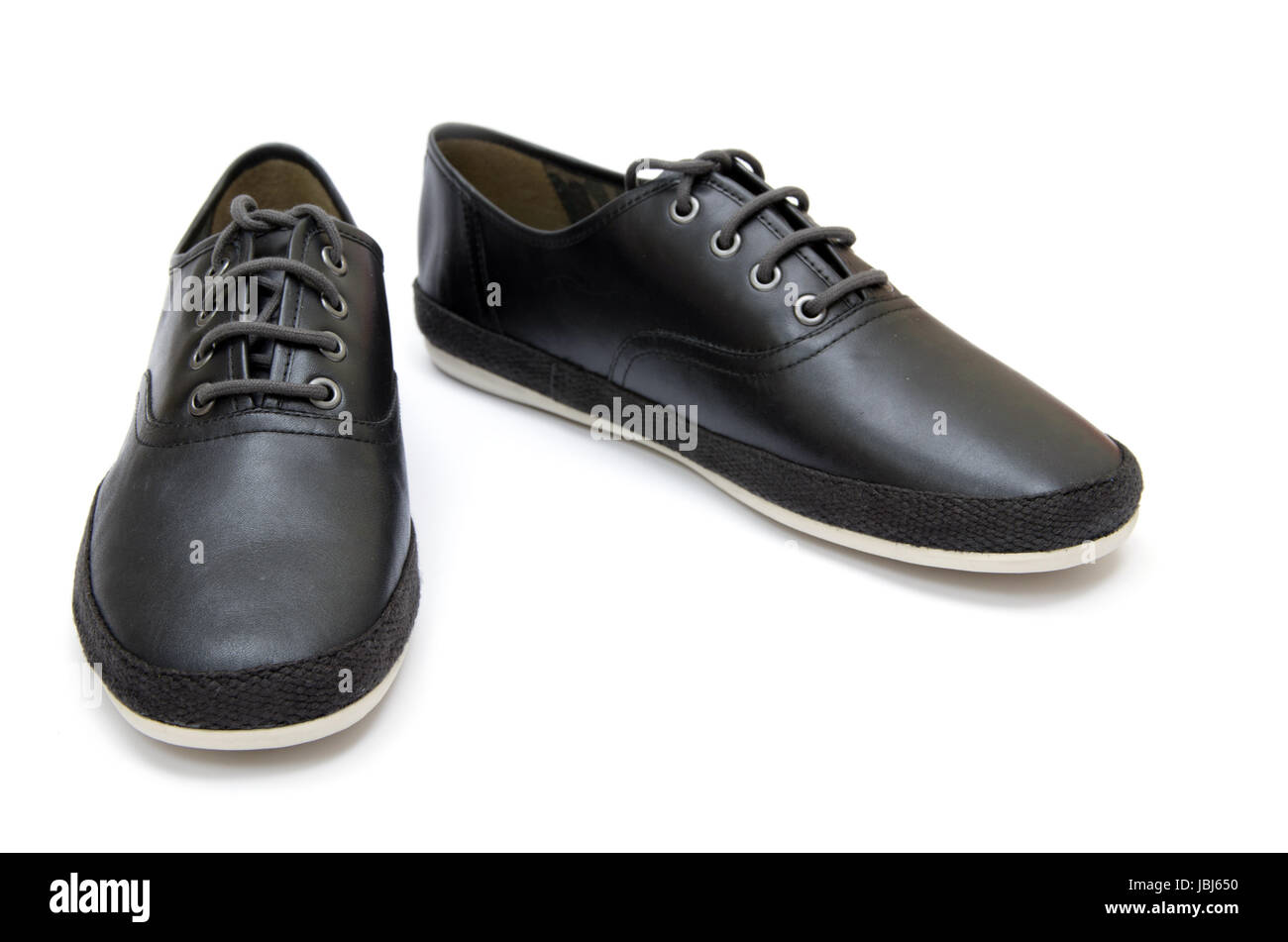 Black shoes isolated on the white background Stock Photo - Alamy