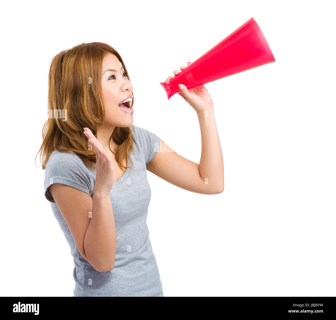 Asia woman yelling through megaphone Stock Photo Alamy